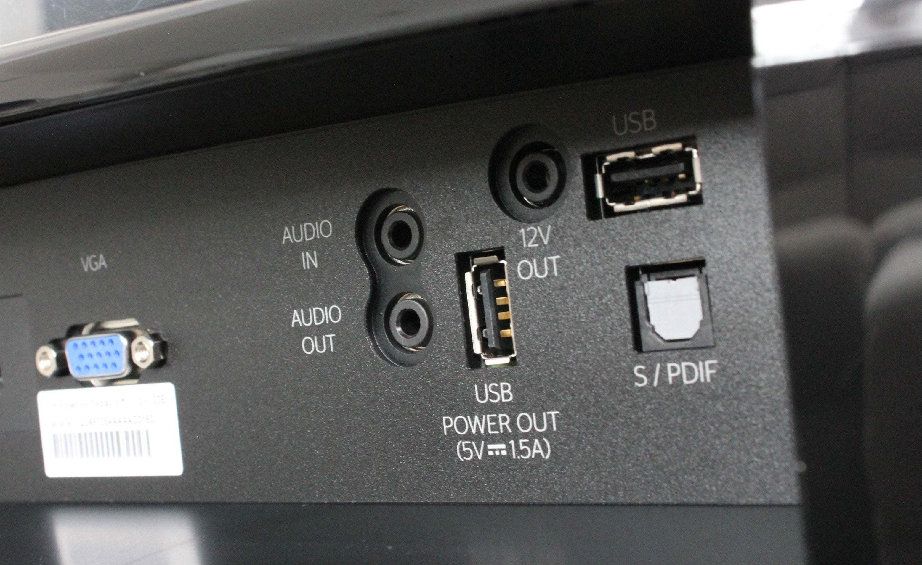 Close-up of Optoma UHD65 projector's rear input-output panel.