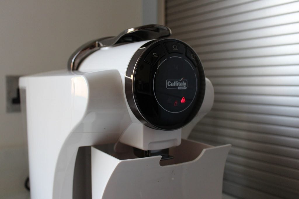 Close-up of a CaffItaly SO5 espresso machine control panel.