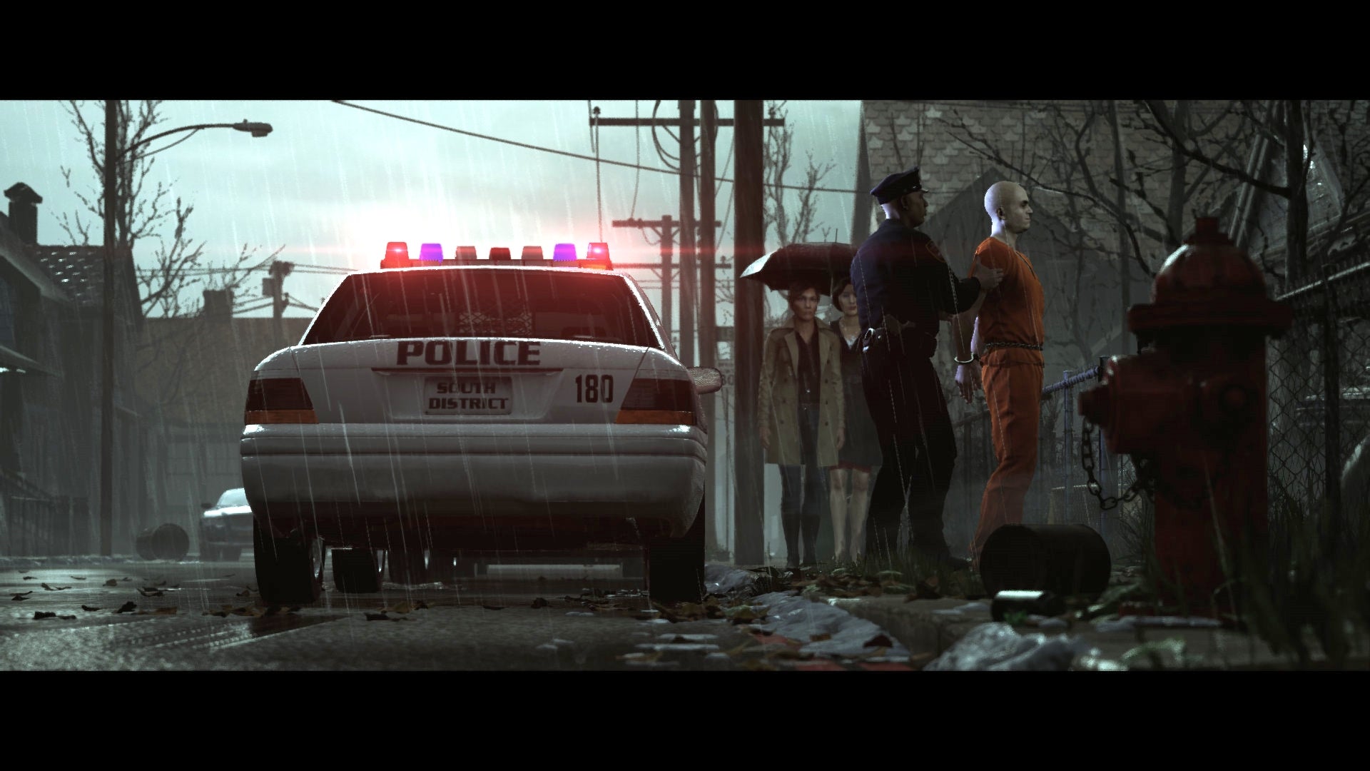 Rainy street scene with police car, officers and a handcuffed person.