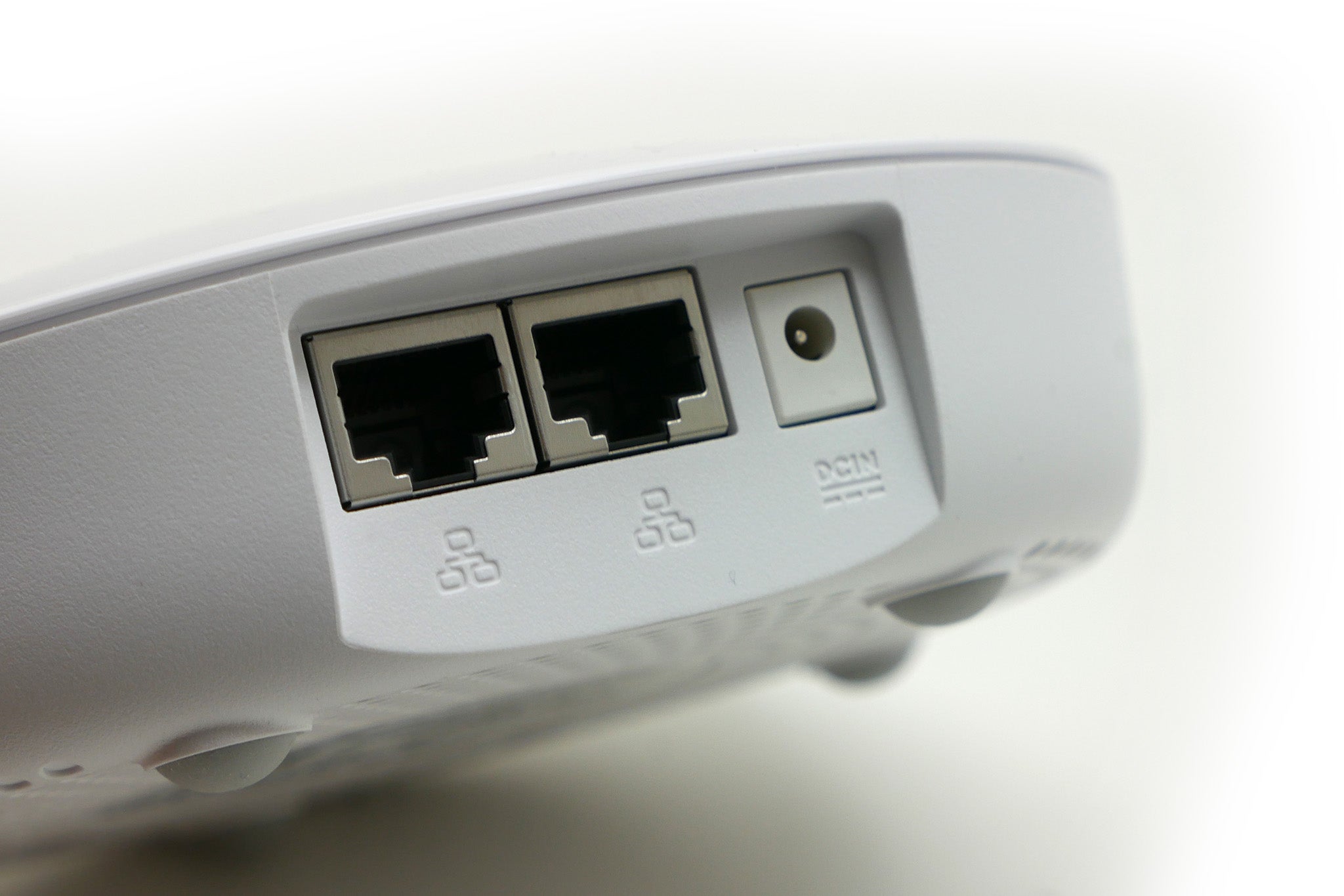 Close-up of Asus Lyra mesh network system ports.