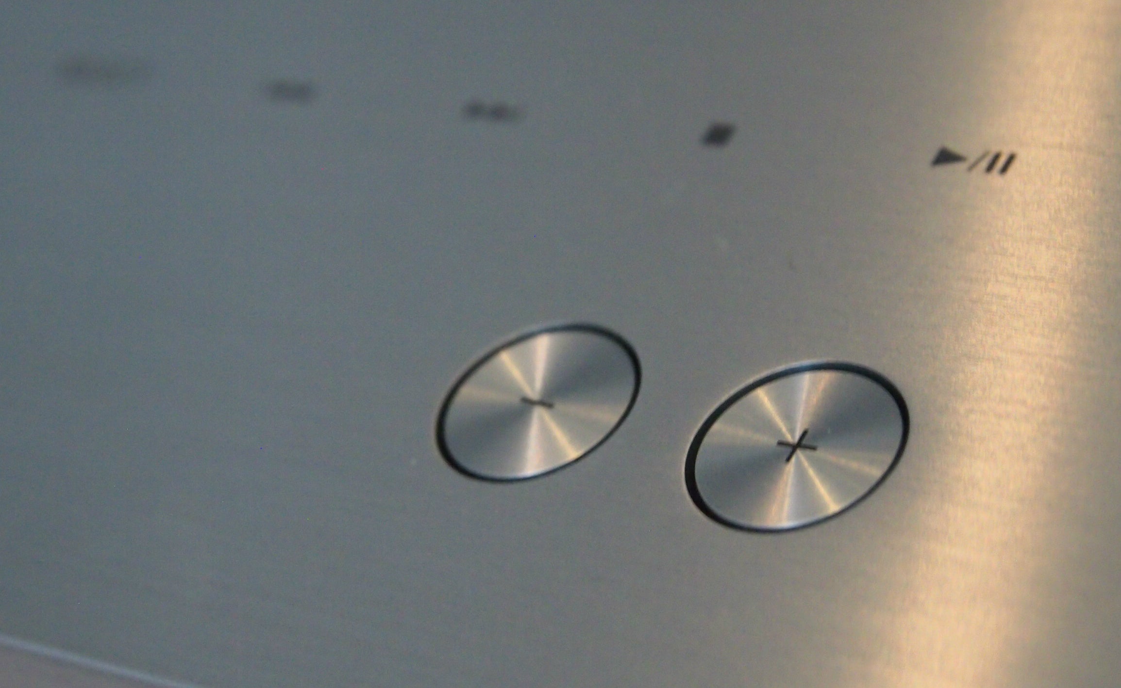 Close-up of Technics Ottava's control buttons.