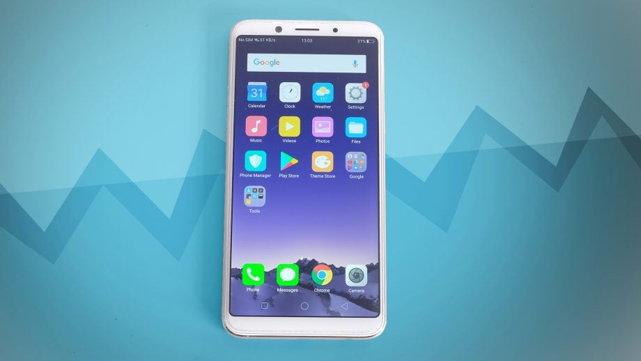 Oppo F5 smartphone on blue background with home screen displayed.