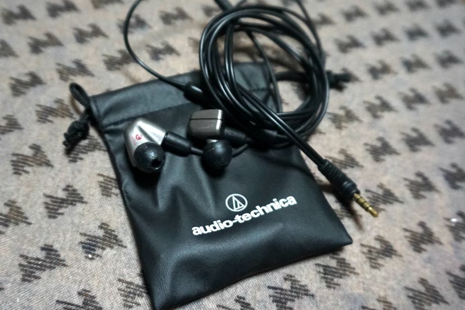 Audio-Technica ATH-LS70iS earphones with carrying pouch.