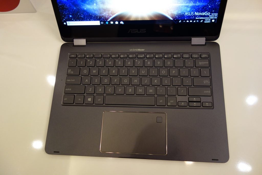 Asus NovaGo laptop on display with keyboard and screen visible.