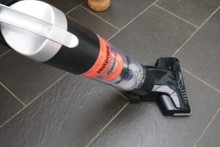 Hotpoint Power Move vacuum cleaner on a tiled floor.