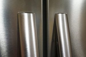 Close-up view of Hisense fridge-freezer's stainless steel doors.