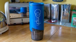 Blue Oomph Coffee Maker on a kitchen counter.