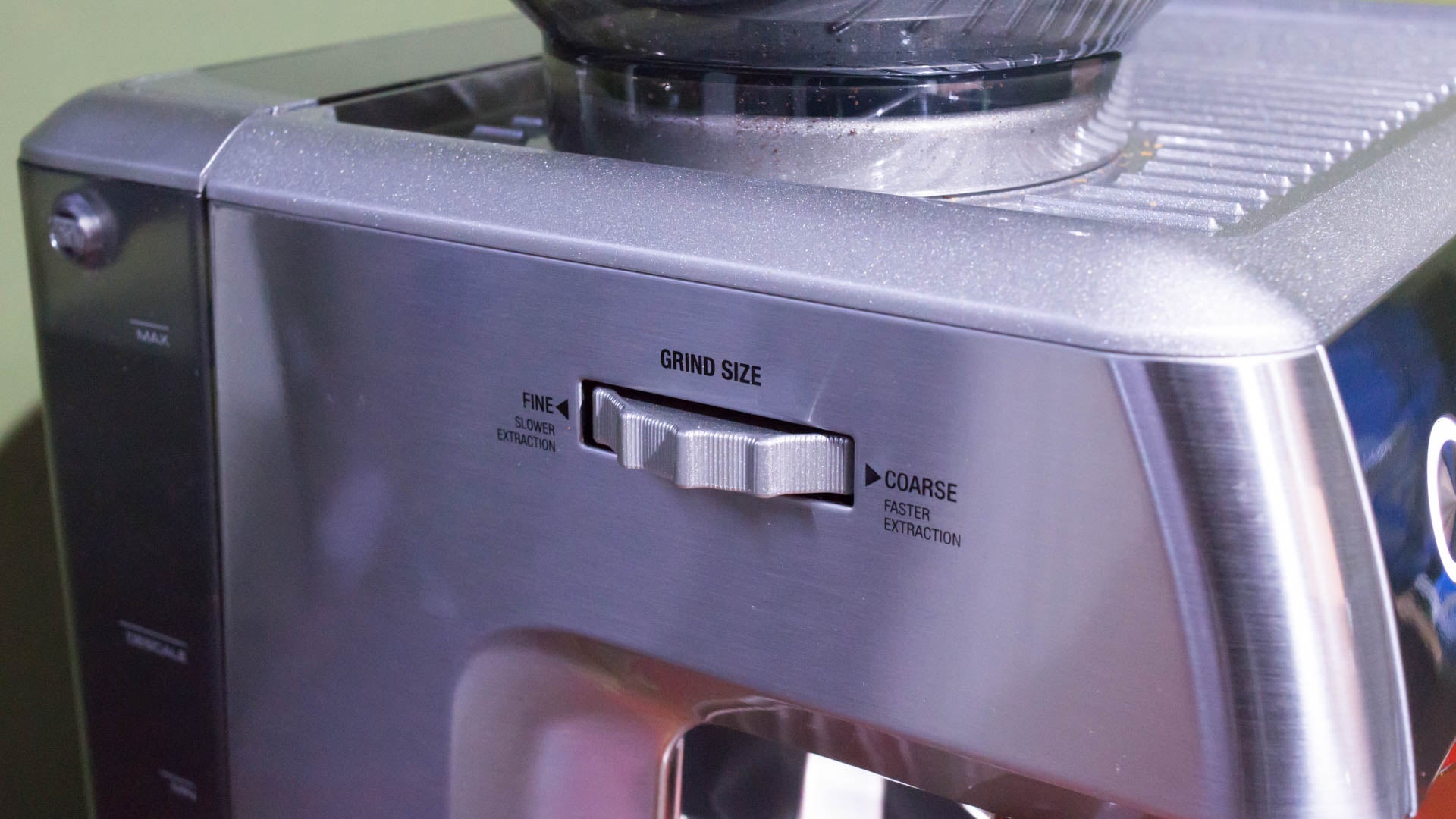 Close-up of Sage Barista Touch coffee grinder size adjustment