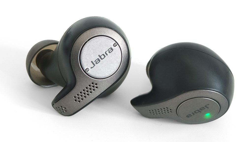 Jabra Elite 65t wireless earbuds with LED indicator.