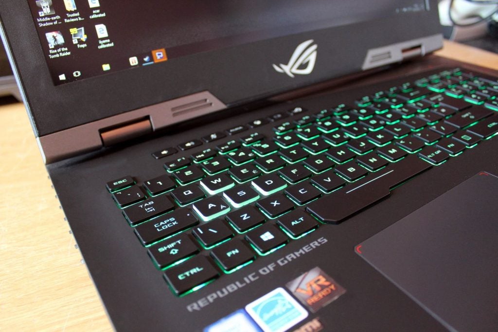 Asus ROG G703 laptop keyboard and screen with logos.