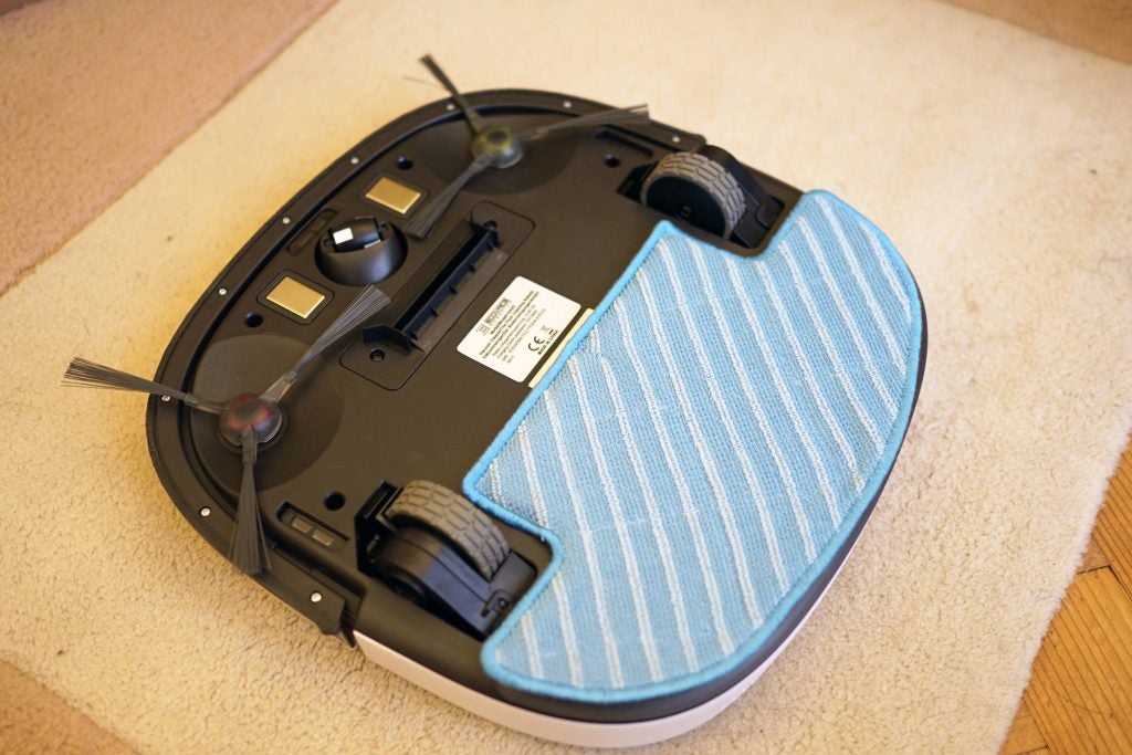 Underside of Ecovacs Deebot Slim2 robotic vacuum cleaner with mop attachment.