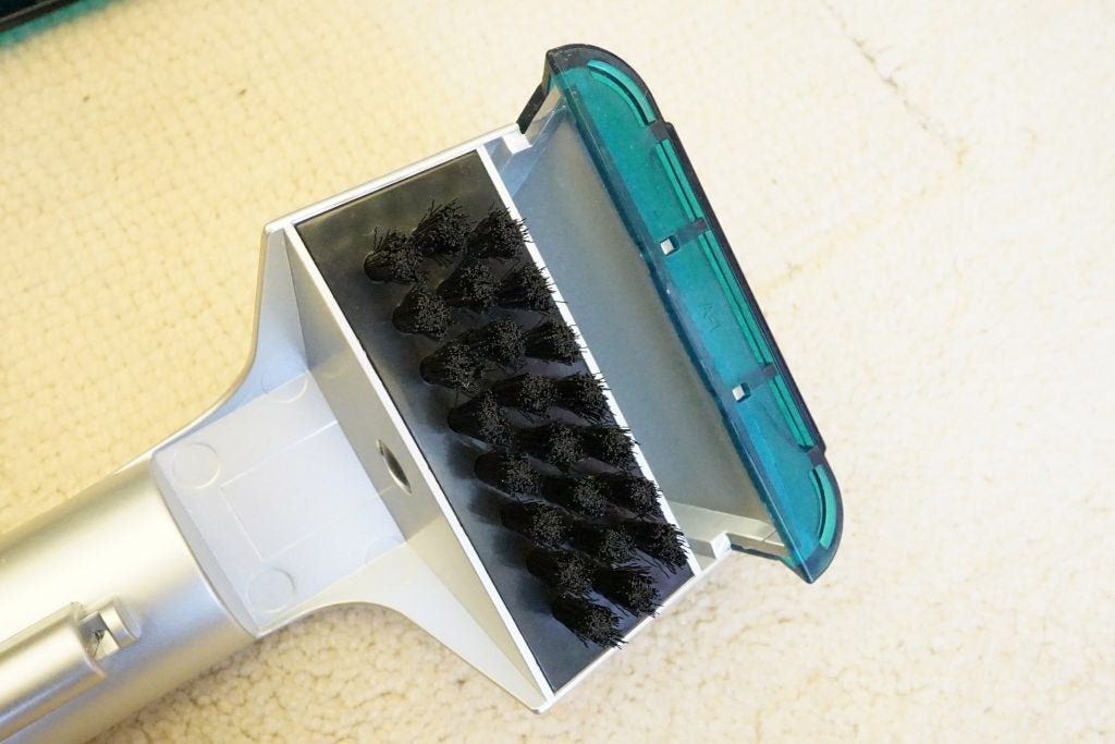 Close-up of Hoover CleanJet brush head on carpet.