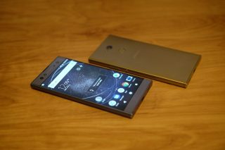 Sony XA2 Ultra smartphone displayed on a wooden surface.