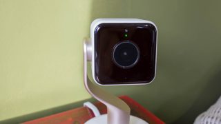 Hive View smart camera on a modern stand indoors.