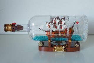 LEGO Ideas Ship in a Bottle set displayed on shelf.