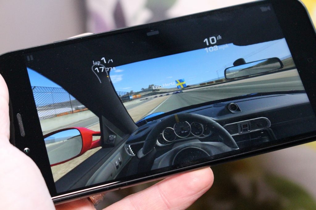 Xiaomi Mi A1 displaying a racing game on screen