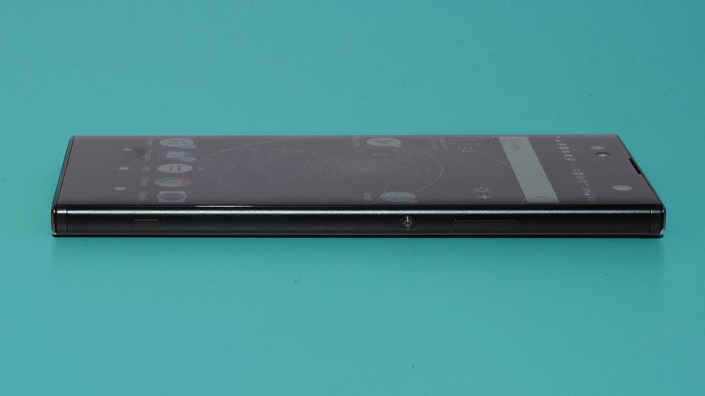 Sony XA2 Ultra smartphone on turquoise background.