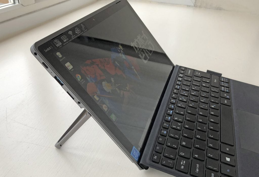 Acer Switch 3 convertible tablet with keyboard on a desk.