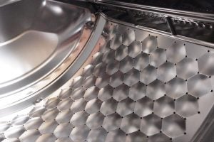 Close-up of Miele WDB020 washing machine drum interior.