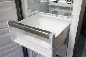 Open freezer drawer of a Whirlpool upright freezer