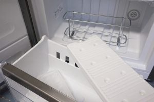 Interior view of a Whirlpool freezer with open drawer.