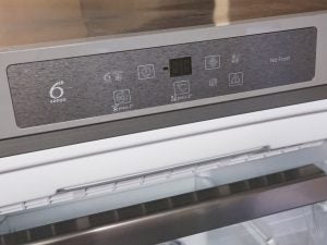 Control panel of Whirlpool freezer with 6th Sense and No Frost features.