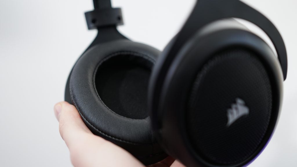 Close-up of Corsair HS50 gaming headset held in hand.