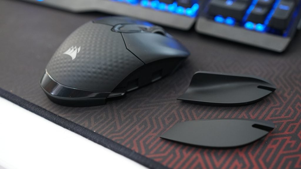 Corsair Dark Core RGB SE wireless mouse with interchangeable side grips.