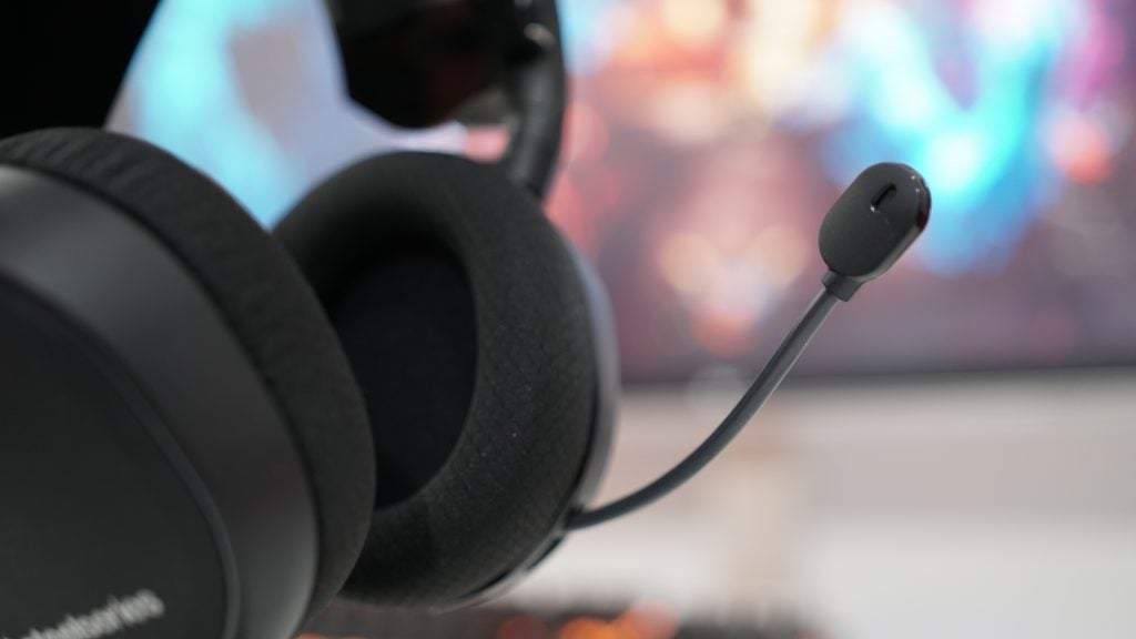 Close-up of SteelSeries Arctis 3 Bluetooth headset with microphone.
