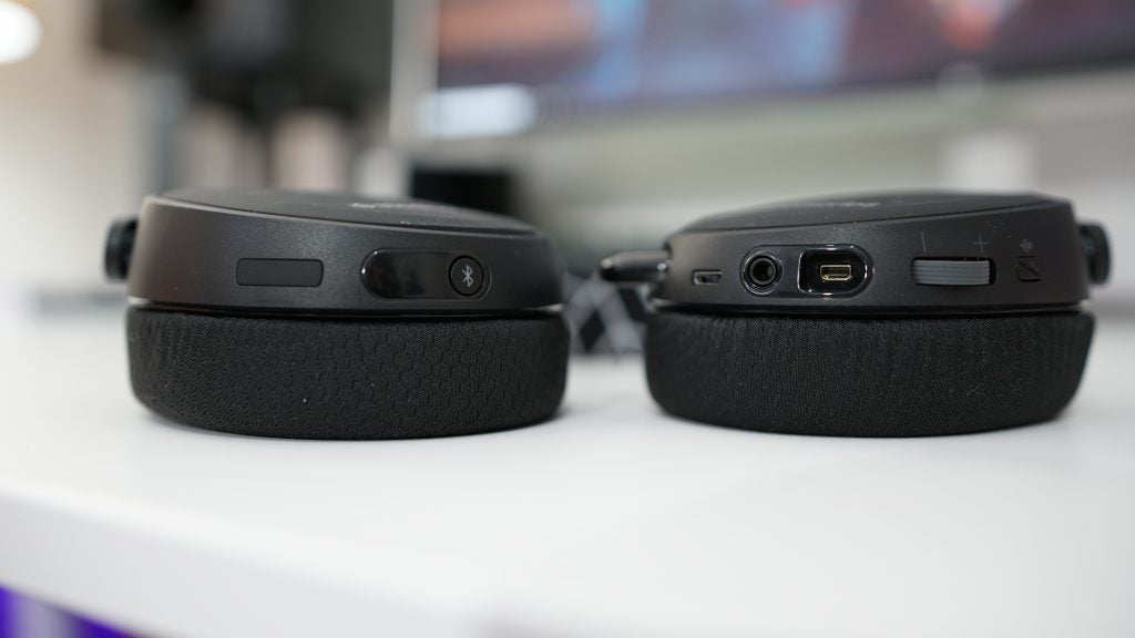 Close-up of SteelSeries Arctis 3 Bluetooth headset controls.