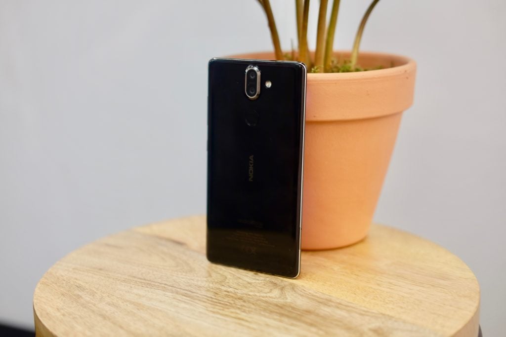 Nokia 8 Sirocco smartphone displayed on a wooden table.