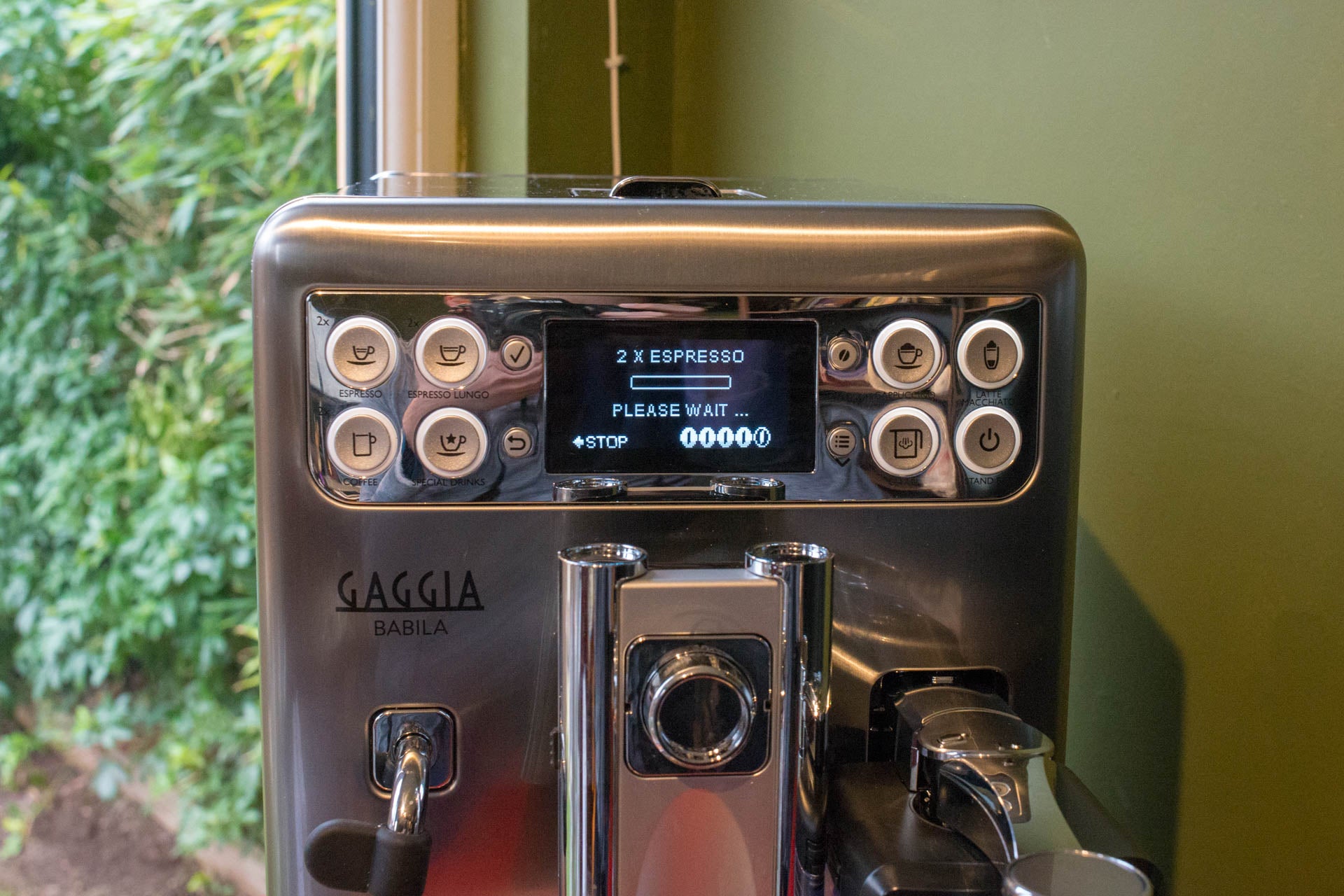 Gaggia Babila espresso machine with display screen and buttons.