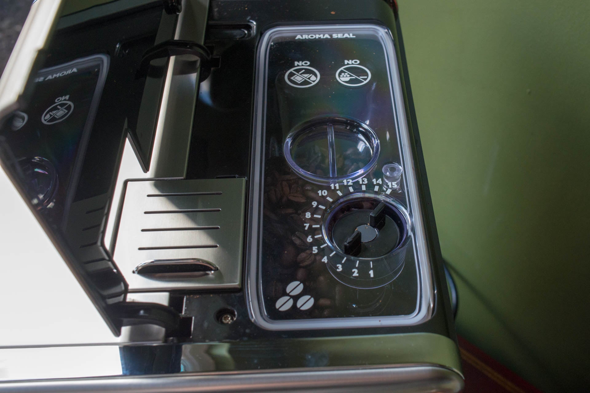 Close-up of Gaggia Babila espresso machine's bean hopper and controls.