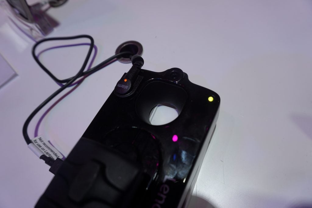 Lenovo Vital Moto Mod with attached finger cuff on display.