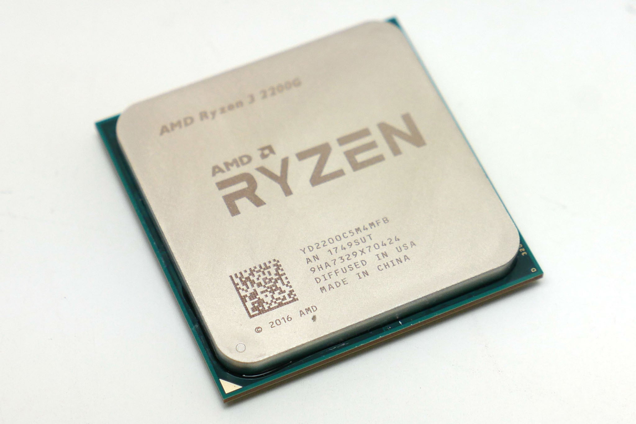 AMD Ryzen 3 2200G processor on white background.