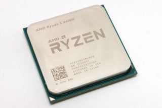 AMD Ryzen 5 2400G CPU close-up on white background.