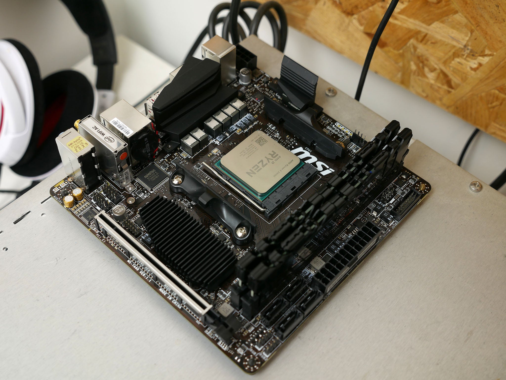 AMD Ryzen 5 motherboard setup on a test bench.