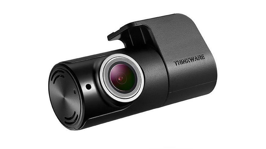 Thinkware F800 Pro dash cam with visible lens and logo.