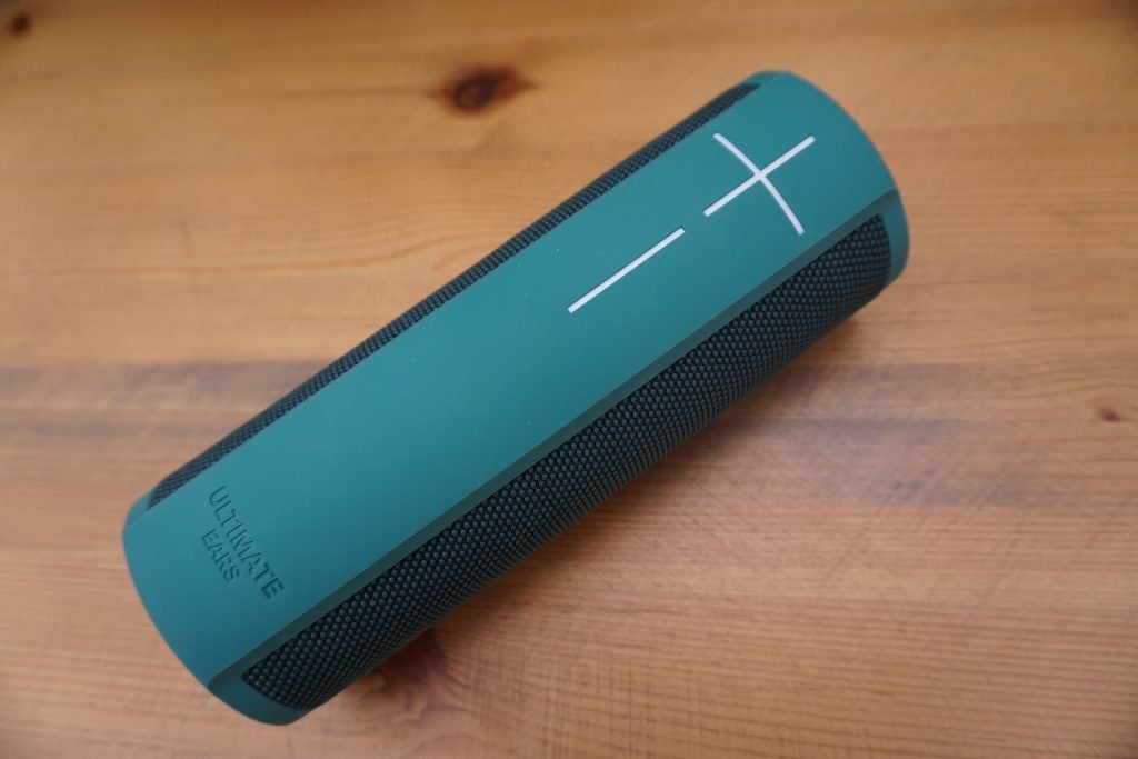 UE Blast portable speaker on a wooden surface.