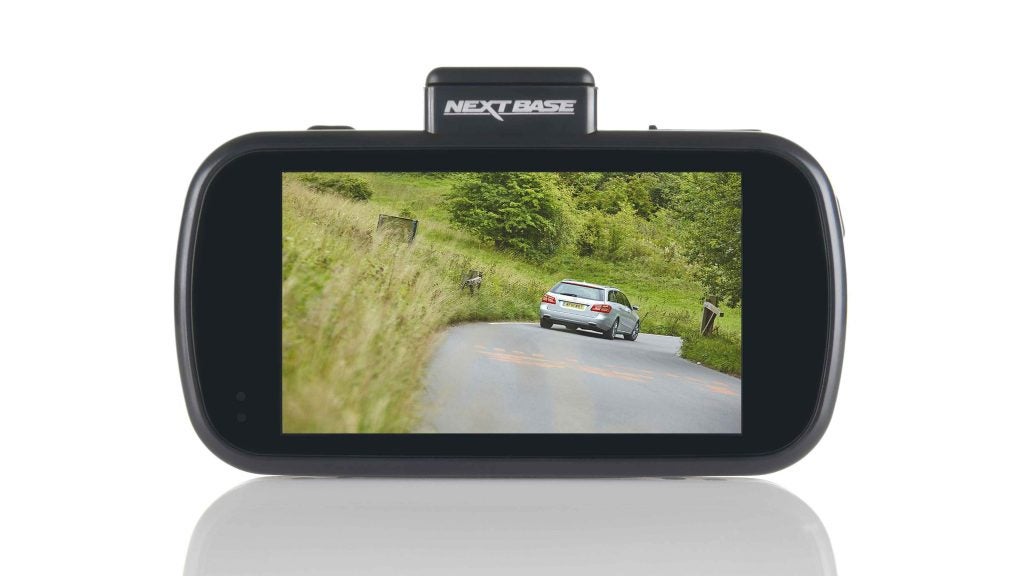 Nextbase 612GW dash cam displaying footage of a car on road.