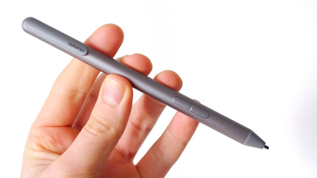 Hand holding Huawei M-Pen for MediaPad M5 Pro.