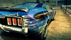 Scratched blue muscle car in Burnout Paradise Remastered.