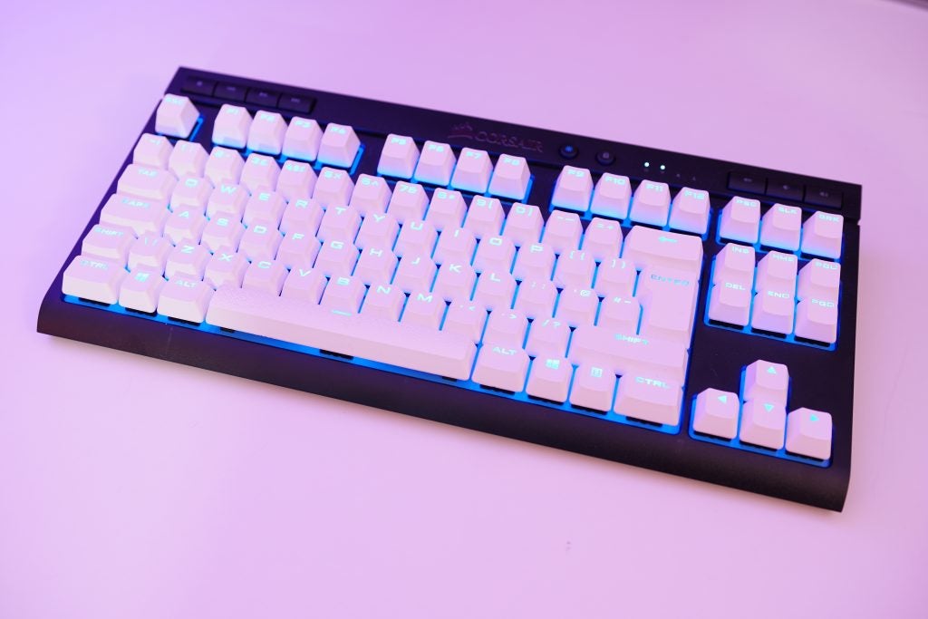 Corsair K63 Wireless keyboard with blue backlighting.