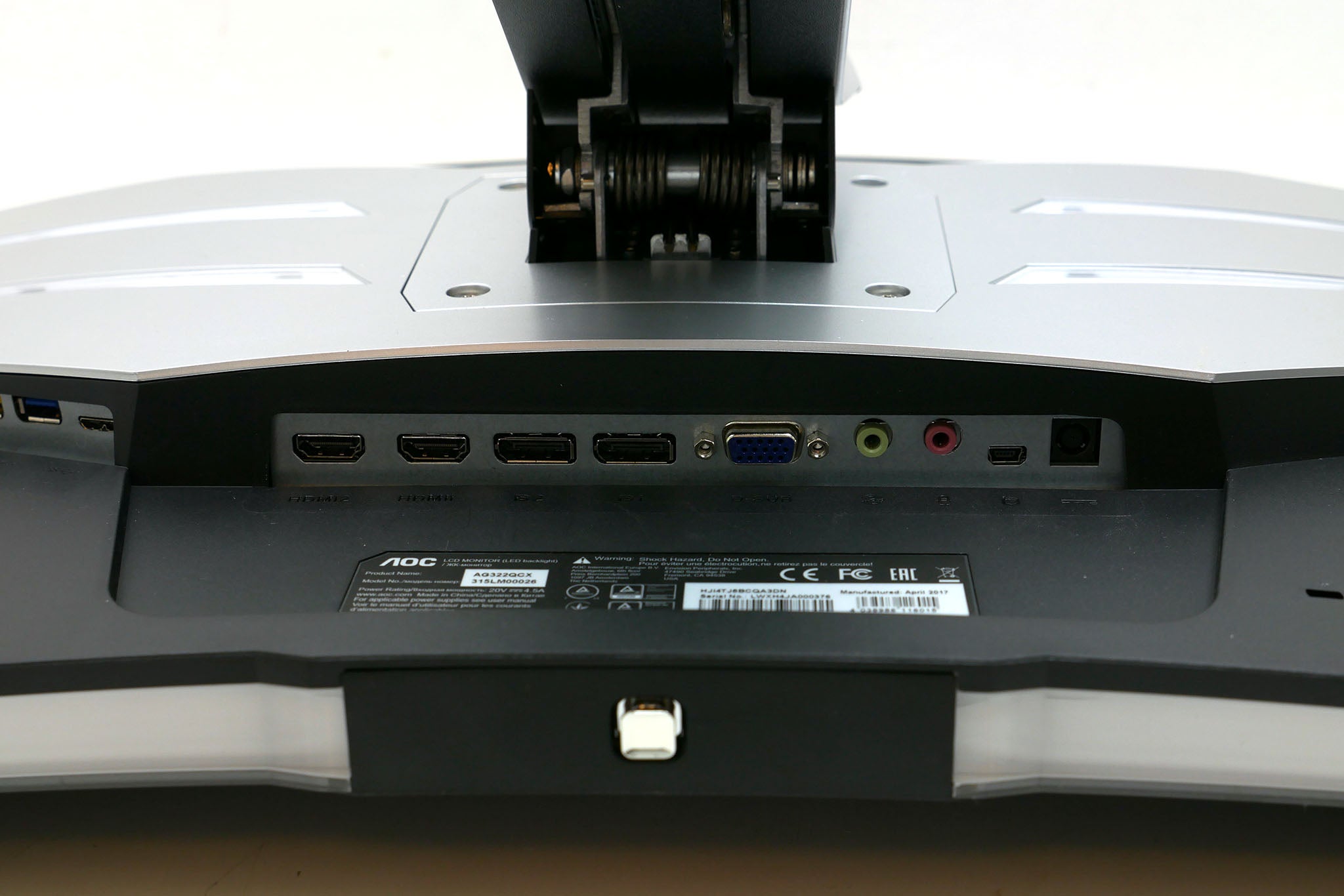 Close-up of AOC AG322QCX monitor's connectivity ports.