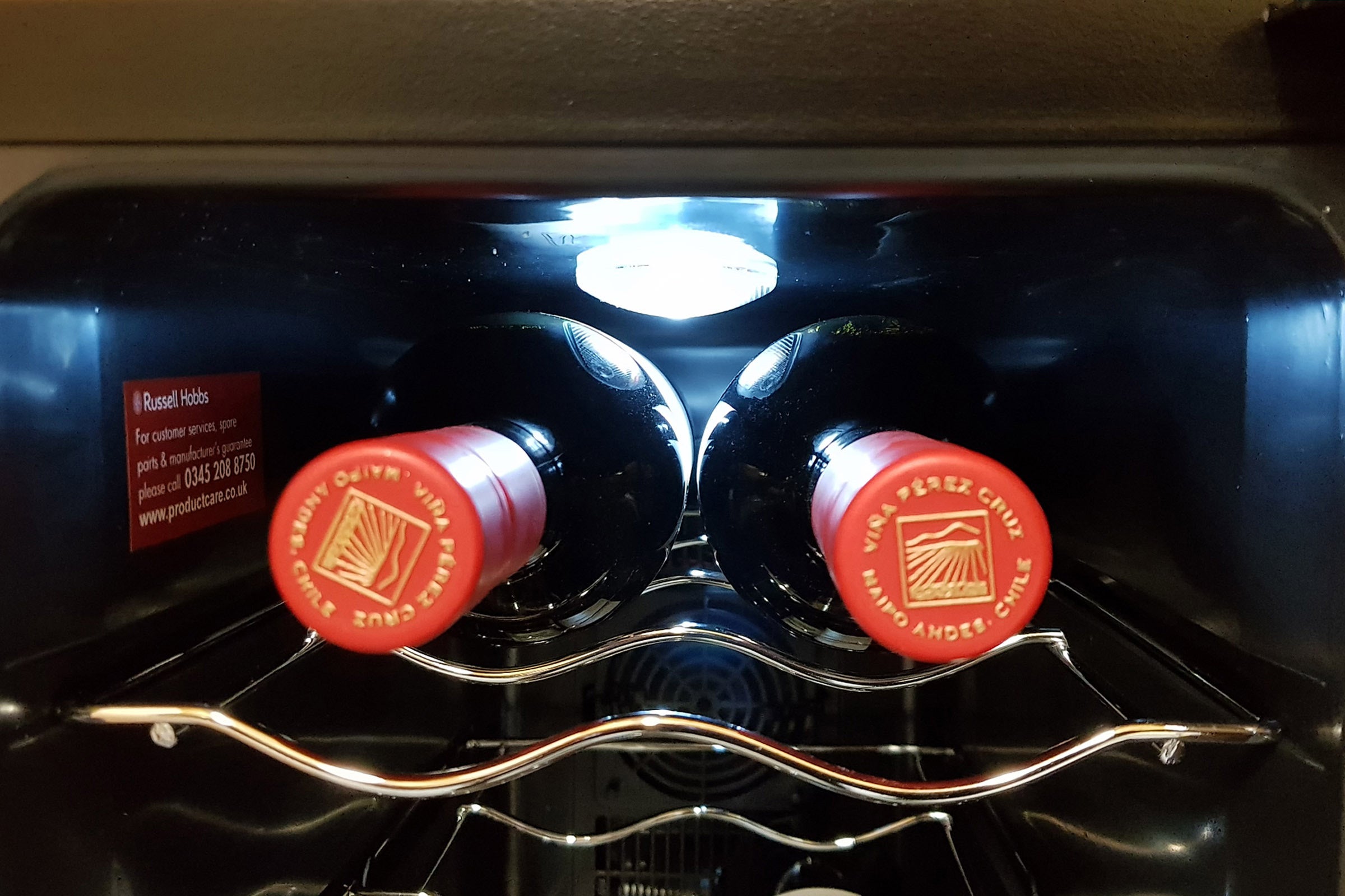 Russell Hobbs RH8WC2 wine cooler with two bottles.