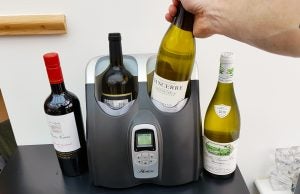 Wine chiller with bottles of red and white wine.