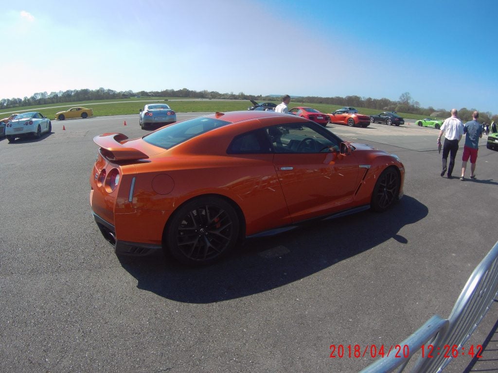 Orange sports car captured with GoXtreme Vision 4K camera