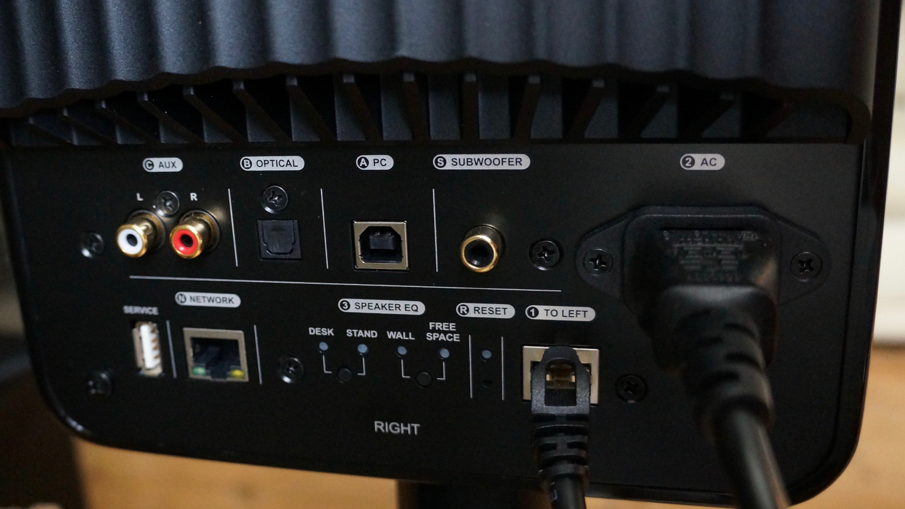 Close-up of KEF LS50 Wireless speaker's connection panel.