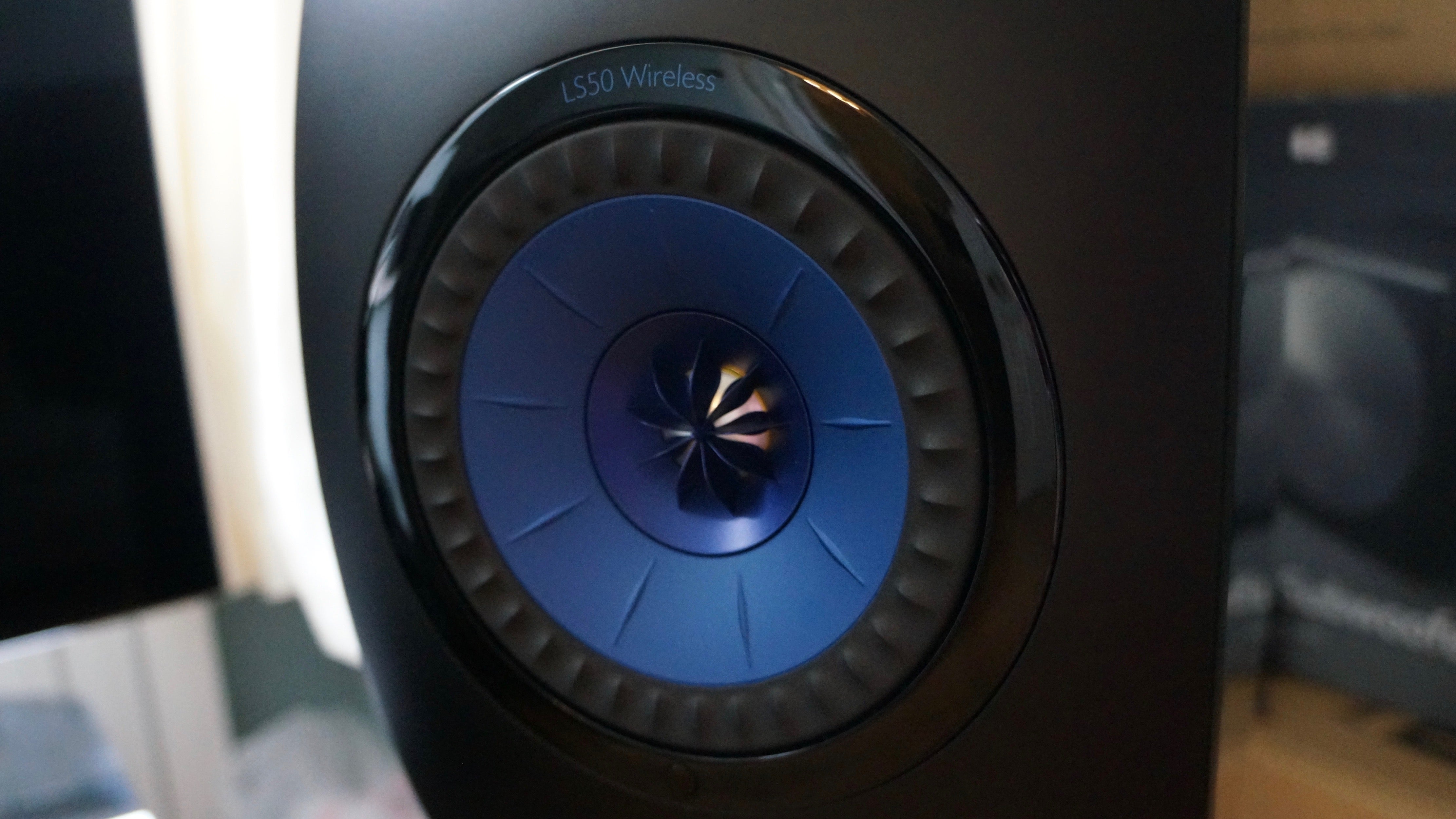 Close-up of a KEF LS50 Wireless speaker driver.