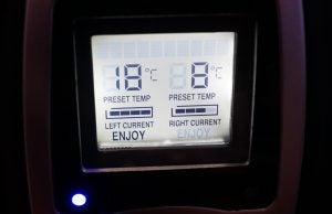 Digital temperature display showing preset and current settings.